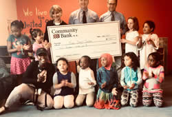 playschool staff and kids accept cheque